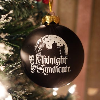 Midnight Syndicate black glass ornament with logo